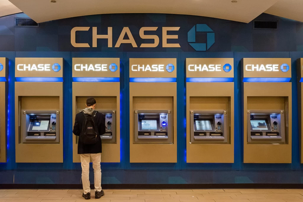 a person withdrawing from chase bank atms